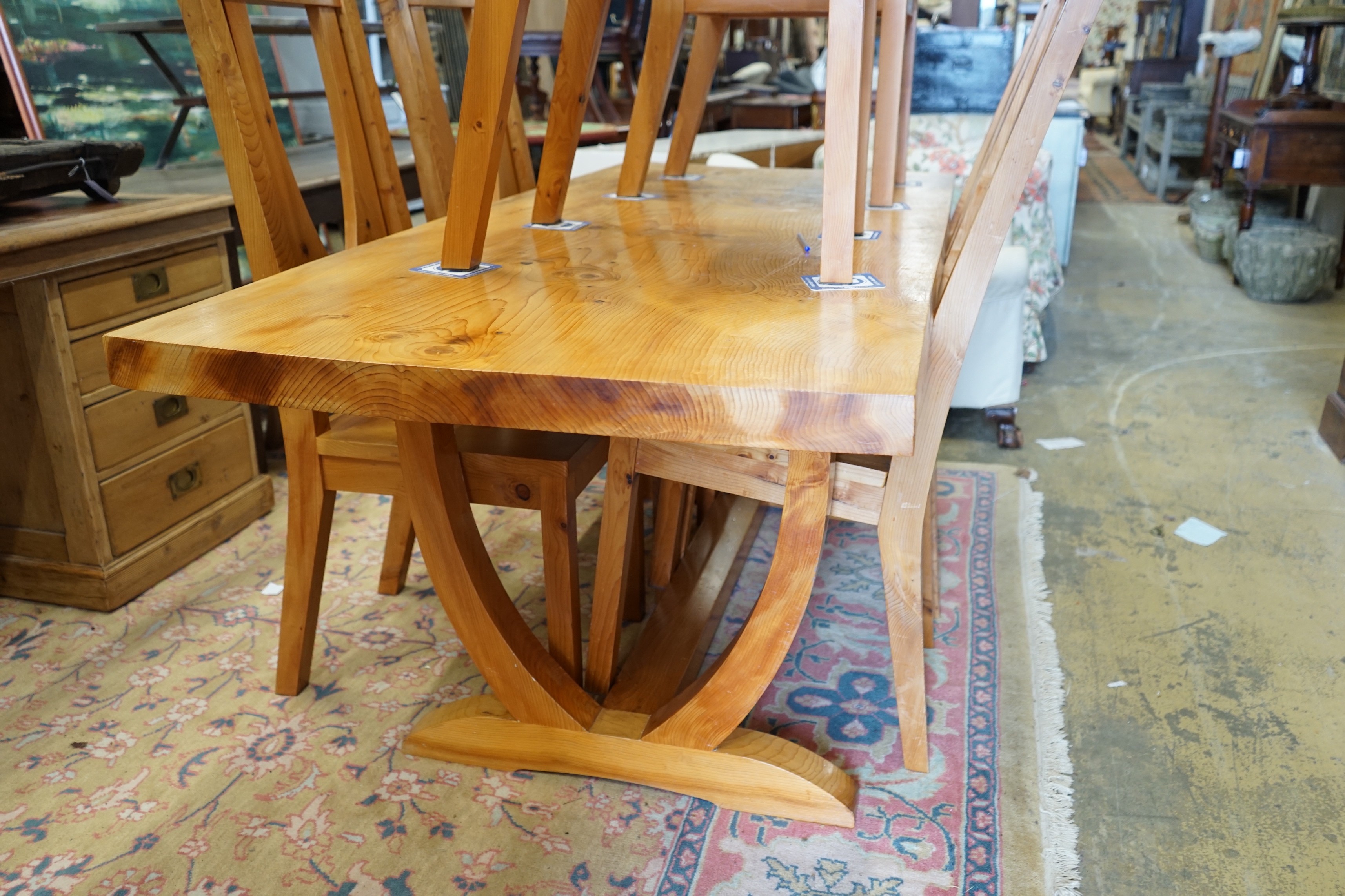 An Ian Anderson cedar rectangular single planked top dining table, length 190cm, width 83cm, height 78cm and six chairs, two with arms